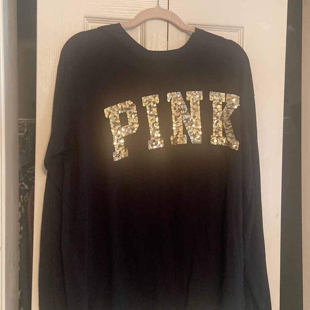 Victoria Secret PINK black long sleeve shirt with gold details.